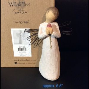 “Loving Angel” figure by artist Susan Lordi
